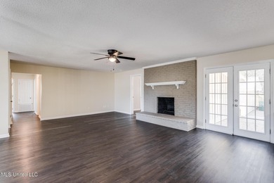 Welcome to this fully renovated, move-in ready ranch home in on Diamondhead Country Club in Mississippi - for sale on GolfHomes.com, golf home, golf lot