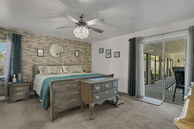 Welcome to this stunning home, where warmth and elegance await on The Grand Club - Pine Lakes Course in Florida - for sale on GolfHomes.com, golf home, golf lot