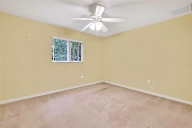 Located in Spring Hill, Hernando County, 6121 Piedmont Dr sits on Oak Hills Country Club in Florida - for sale on GolfHomes.com, golf home, golf lot