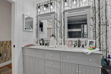 Welcome to this stunning home, where warmth and elegance await on The Grand Club - Pine Lakes Course in Florida - for sale on GolfHomes.com, golf home, golf lot