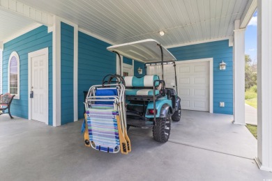 Gorgeous raised beach house near the Cherry Grove section of on Tidewater Golf Club and Plantation in South Carolina - for sale on GolfHomes.com, golf home, golf lot