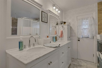 Welcome to this stunning home, where warmth and elegance await on The Grand Club - Pine Lakes Course in Florida - for sale on GolfHomes.com, golf home, golf lot