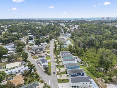Gorgeous raised beach house near the Cherry Grove section of on Tidewater Golf Club and Plantation in South Carolina - for sale on GolfHomes.com, golf home, golf lot