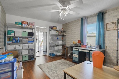 Welcome to this stunning home, where warmth and elegance await on The Grand Club - Pine Lakes Course in Florida - for sale on GolfHomes.com, golf home, golf lot