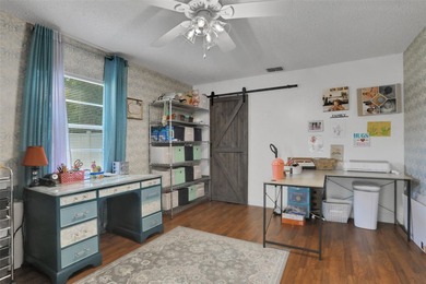 Welcome to this stunning home, where warmth and elegance await on The Grand Club - Pine Lakes Course in Florida - for sale on GolfHomes.com, golf home, golf lot