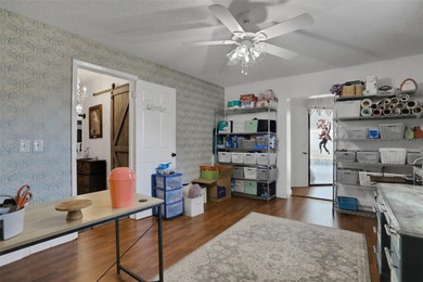 Welcome to this stunning home, where warmth and elegance await on The Grand Club - Pine Lakes Course in Florida - for sale on GolfHomes.com, golf home, golf lot