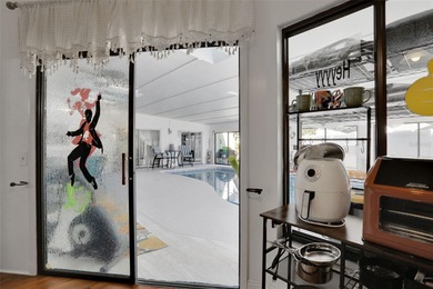 Welcome to this stunning home, where warmth and elegance await on The Grand Club - Pine Lakes Course in Florida - for sale on GolfHomes.com, golf home, golf lot