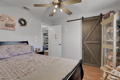 Welcome to this stunning home, where warmth and elegance await on The Grand Club - Pine Lakes Course in Florida - for sale on GolfHomes.com, golf home, golf lot