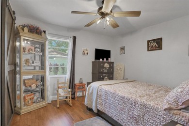 Welcome to this stunning home, where warmth and elegance await on The Grand Club - Pine Lakes Course in Florida - for sale on GolfHomes.com, golf home, golf lot