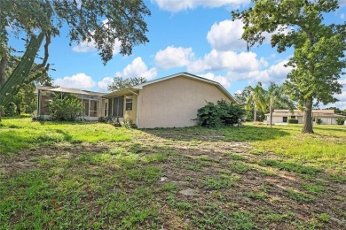 Located in Spring Hill, Hernando County, 6121 Piedmont Dr sits on Oak Hills Country Club in Florida - for sale on GolfHomes.com, golf home, golf lot