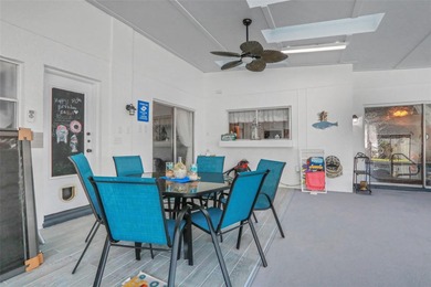 Welcome to this stunning home, where warmth and elegance await on The Grand Club - Pine Lakes Course in Florida - for sale on GolfHomes.com, golf home, golf lot