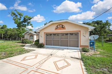 Located in Spring Hill, Hernando County, 6121 Piedmont Dr sits on Oak Hills Country Club in Florida - for sale on GolfHomes.com, golf home, golf lot