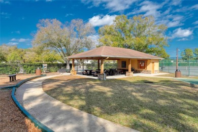 UPDATED AND MOVE-IN READY! This beautifully maintained one-story on The Eagles Golf Course and Club in Florida - for sale on GolfHomes.com, golf home, golf lot