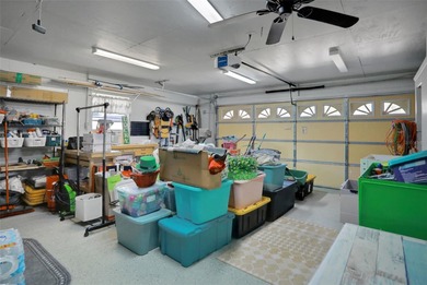 Welcome to this stunning home, where warmth and elegance await on The Grand Club - Pine Lakes Course in Florida - for sale on GolfHomes.com, golf home, golf lot