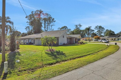 Welcome to this stunning home, where warmth and elegance await on The Grand Club - Pine Lakes Course in Florida - for sale on GolfHomes.com, golf home, golf lot