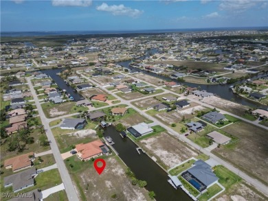 Scoop up this prime Gulf access residential lot in highly on Burnt Store Golf Club in Florida - for sale on GolfHomes.com, golf home, golf lot