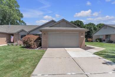 This beautifully maintained 2 bed, 2.5-bath end unit ranch condo on Fellows Creek Golf Club in Michigan - for sale on GolfHomes.com, golf home, golf lot