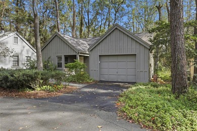 Nestled on a beautiful wooded lot in the Founders Hill on Haile Plantation Golf and Country Club in Florida - for sale on GolfHomes.com, golf home, golf lot