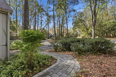 Nestled on a beautiful wooded lot in the Founders Hill on Haile Plantation Golf and Country Club in Florida - for sale on GolfHomes.com, golf home, golf lot