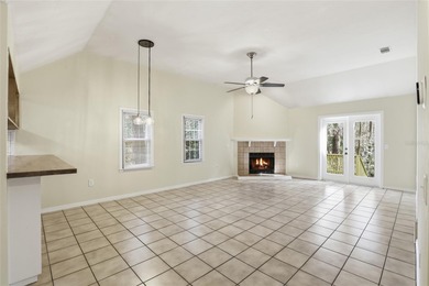 Nestled on a beautiful wooded lot in the Founders Hill on Haile Plantation Golf and Country Club in Florida - for sale on GolfHomes.com, golf home, golf lot