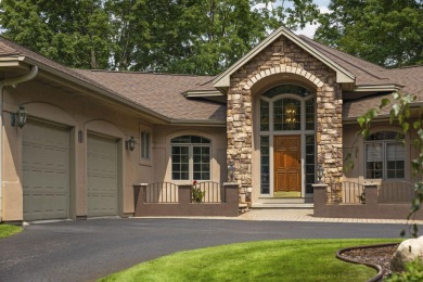 Luxury living in this commanding, quality built 3-bedroom on The Loon Golf Resort in Michigan - for sale on GolfHomes.com, golf home, golf lot