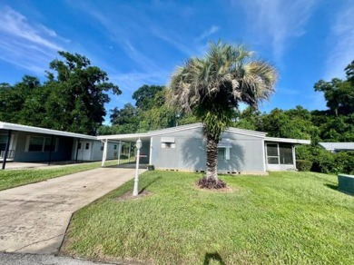 Home is located in Water Oak Country Club Estates in Lady Lake on Water Oak Country Club Estates in Florida - for sale on GolfHomes.com, golf home, golf lot