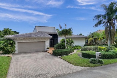 Step into this beautiful 3-bed, 2-bath home in Woodmont's on Woodmont Country Club in Florida - for sale on GolfHomes.com, golf home, golf lot