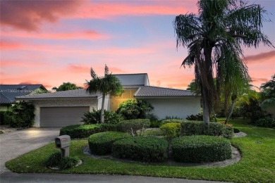 Step into this beautiful 3-bed, 2-bath home in Woodmont's on Woodmont Country Club in Florida - for sale on GolfHomes.com, golf home, golf lot