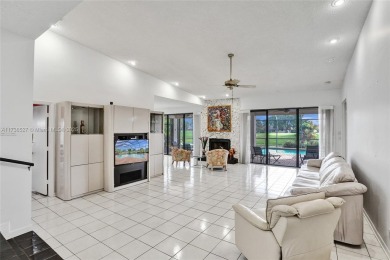 Step into this beautiful 3-bed, 2-bath home in Woodmont's on Woodmont Country Club in Florida - for sale on GolfHomes.com, golf home, golf lot