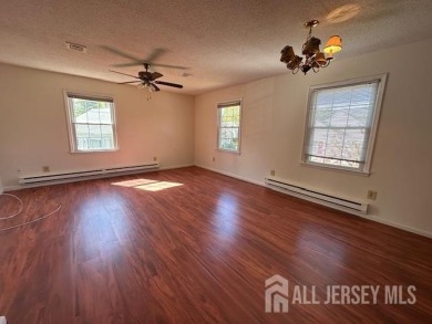 This lovely Rossmoor bright and sunny unit on the second level on Rossmoor Golf Club in New Jersey - for sale on GolfHomes.com, golf home, golf lot