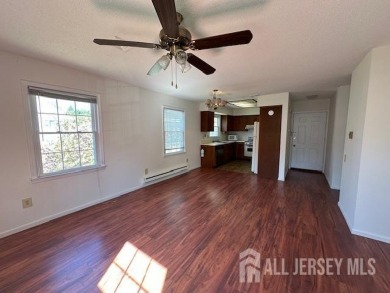 This lovely Rossmoor bright and sunny unit on the second level on Rossmoor Golf Club in New Jersey - for sale on GolfHomes.com, golf home, golf lot