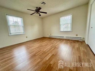 This lovely Rossmoor bright and sunny unit on the second level on Rossmoor Golf Club in New Jersey - for sale on GolfHomes.com, golf home, golf lot