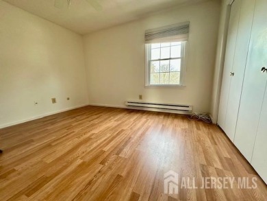This lovely Rossmoor bright and sunny unit on the second level on Rossmoor Golf Club in New Jersey - for sale on GolfHomes.com, golf home, golf lot