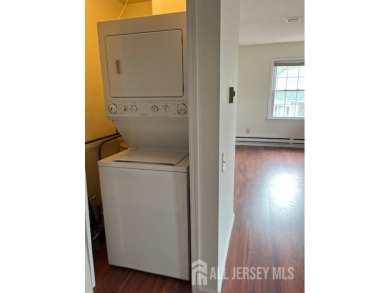 This lovely Rossmoor bright and sunny unit on the second level on Rossmoor Golf Club in New Jersey - for sale on GolfHomes.com, golf home, golf lot