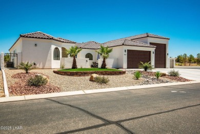 Located at 6322 S Via De Oro, Fort Mohave, Arizona, this on Los Lagos Golf Club in Arizona - for sale on GolfHomes.com, golf home, golf lot