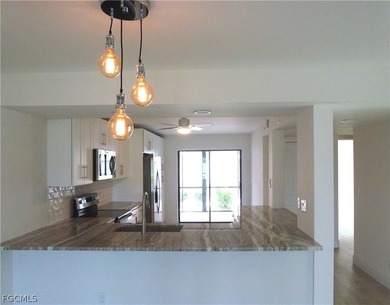 This 2 bedroom + den 2 bathroom condo on the 1st floor is on  in Florida - for sale on GolfHomes.com, golf home, golf lot