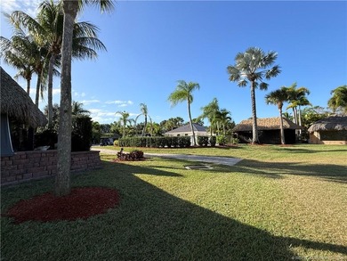 Welcome to this tropical sanctuary, where luxury and attention on St. Lucie Trail Golf Club in Florida - for sale on GolfHomes.com, golf home, golf lot