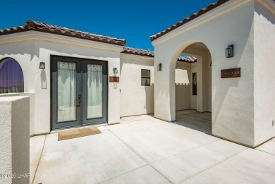 Located at 6322 S Via De Oro, Fort Mohave, Arizona, this on Los Lagos Golf Club in Arizona - for sale on GolfHomes.com, golf home, golf lot