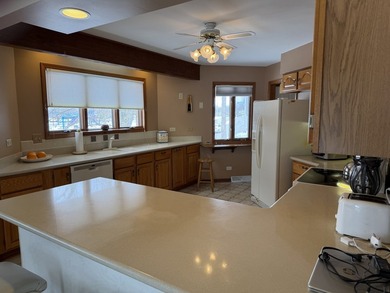 Huge 2 bedroom (with possibilities of making it a 4 bedroom) all on Poplar Creek Country Club in Illinois - for sale on GolfHomes.com, golf home, golf lot