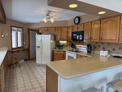 Huge 2 bedroom (with possibilities of making it a 4 bedroom) all on Poplar Creek Country Club in Illinois - for sale on GolfHomes.com, golf home, golf lot