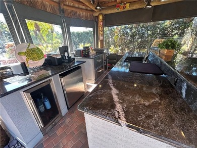 Welcome to this tropical sanctuary, where luxury and attention on St. Lucie Trail Golf Club in Florida - for sale on GolfHomes.com, golf home, golf lot