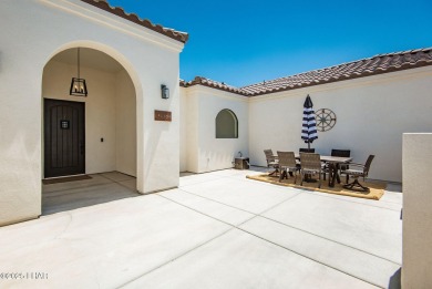 Located at 6322 S Via De Oro, Fort Mohave, Arizona, this on Los Lagos Golf Club in Arizona - for sale on GolfHomes.com, golf home, golf lot