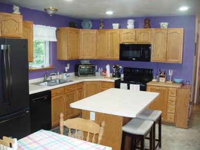 (351/PB) Cherry! Best describes this 3-bedroom, 2-bath home on on Prentice Golf Club in Wisconsin - for sale on GolfHomes.com, golf home, golf lot