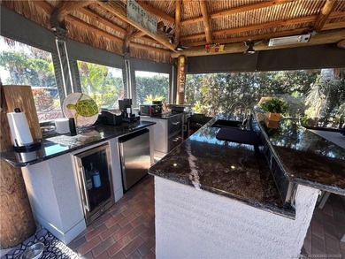 Welcome to this tropical sanctuary, where luxury and attention on St. Lucie Trail Golf Club in Florida - for sale on GolfHomes.com, golf home, golf lot