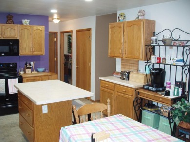 (351/PB) Cherry! Best describes this 3-bedroom, 2-bath home on on Prentice Golf Club in Wisconsin - for sale on GolfHomes.com, golf home, golf lot