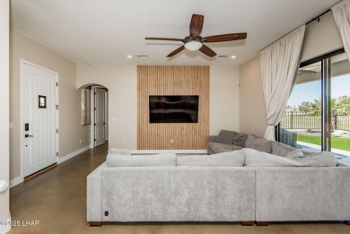 Located at 6322 S Via De Oro, Fort Mohave, Arizona, this on Los Lagos Golf Club in Arizona - for sale on GolfHomes.com, golf home, golf lot