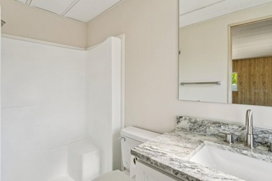 One or more photo(s) has been virtually staged. Move-in ready | on Brookridge Country Club in Florida - for sale on GolfHomes.com, golf home, golf lot