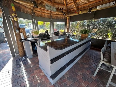 Welcome to this tropical sanctuary, where luxury and attention on St. Lucie Trail Golf Club in Florida - for sale on GolfHomes.com, golf home, golf lot