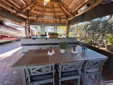 Welcome to this tropical sanctuary, where luxury and attention on St. Lucie Trail Golf Club in Florida - for sale on GolfHomes.com, golf home, golf lot