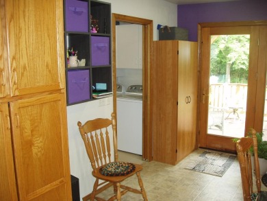 (351/PB) Cherry! Best describes this 3-bedroom, 2-bath home on on Prentice Golf Club in Wisconsin - for sale on GolfHomes.com, golf home, golf lot